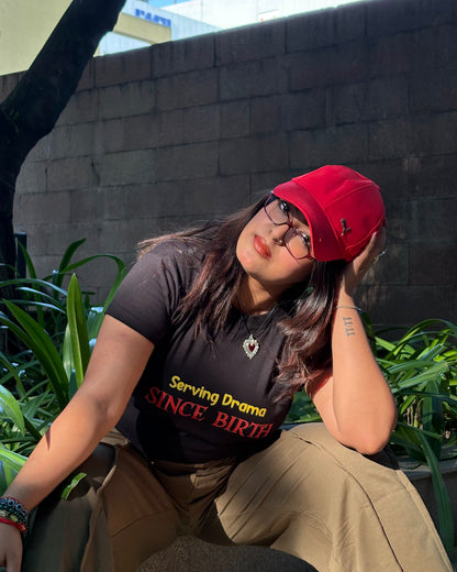 SERVING DRAMA SINCE BIRTH Crop Top