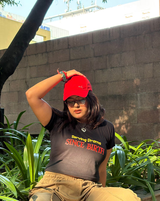 SERVING DRAMA SINCE BIRTH Crop Top